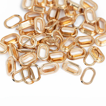 We R Crop-A-Dile Oval Eyelets, 50 pack (DORADOS) + We R Makers Oval Crop-A-Dile Punch and Eyelet Setter